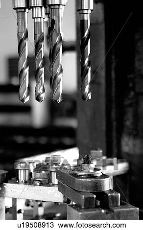 Stock Image - Industrial drill press. Fotosearch