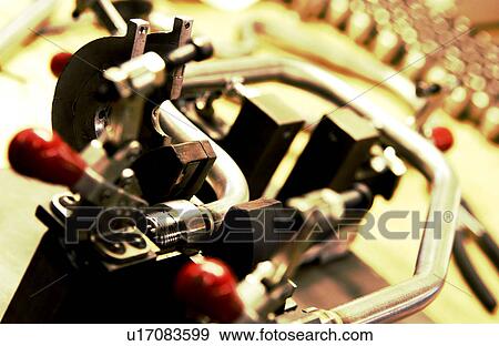 Industrial pipe bending machine View Large Photo Image Stock Photo - Industrial pipe bending machine. Fotosearch