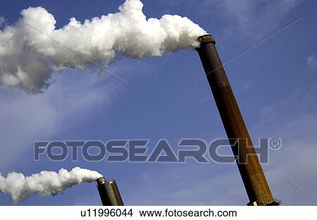 Picture - Industrial smoke stacks. Fotosearch