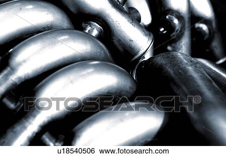 Stock Photograph - Metal pipe products in manufacturing plant. Fotosearch