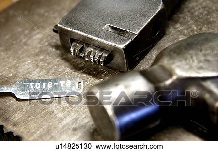 Stock Image - Metal stamping tool. Fotosearch