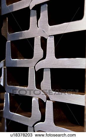 Stacks of metal parts in a factory View Large Photo Image Stock Image - Stacks of metal parts in a factory. Fotosearch