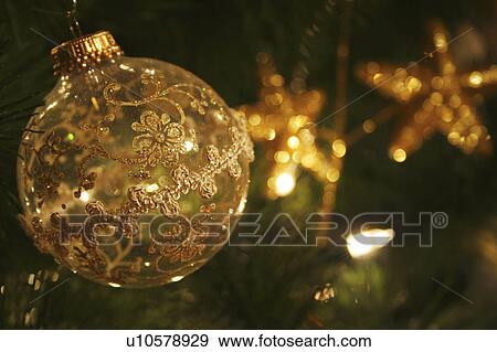 Christmas ornaments on tree View Large Photo Image Stock Photo - Christmas ornaments on tree. Fotosearch