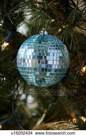 Picture - Ornament hanging on Christmas tree. Fotosearch