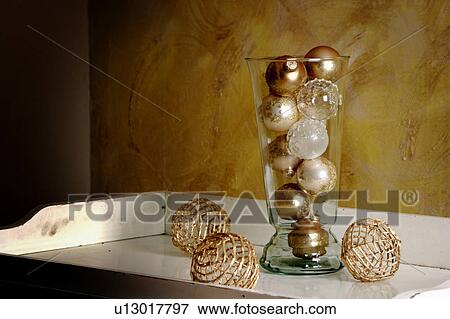 Ornaments in glass vase View Large Photo Image Stock Photo - Ornaments in glass vase. Fotosearch