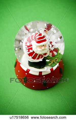 Stock Photograph - Santa globe. Fotosearch