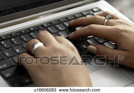 Hands on laptop View Large Photo Image Stock Image - Hands on laptop. Fotosearch