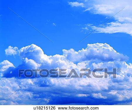 Stock Photograph - sky, skies, nature, blue sky, white clouds, clouds. Fotosearch