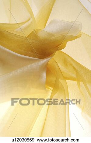 Stock Photo - Sheer white and yellow fabric. Fotosearch