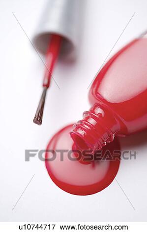 A pouring nail polish bottle View Large Photo Image Stock Photo - A pouring nail polish bottle. Fotosearch