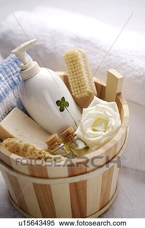 Stock Photography - Bathing accessories in a tub. Fotosearch