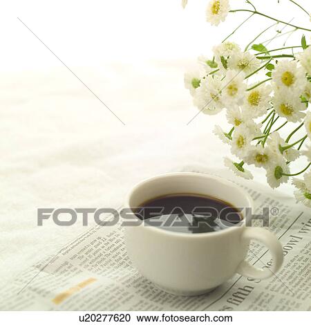Stock Image - Coffee and newspaper. Fotosearch