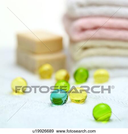Stock Photo - Colorful ball-shaped shower gel, close-up. Fotosearch