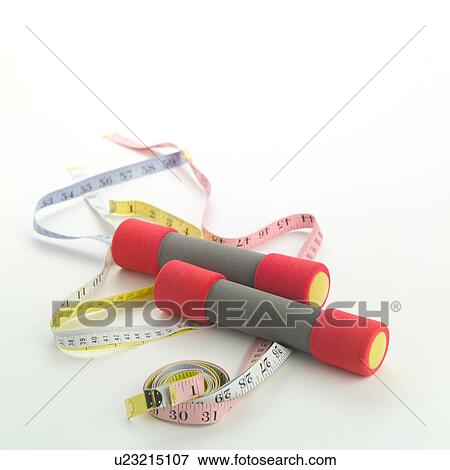 Stock Photo - Dumbbells and measuring tape. Fotosearch