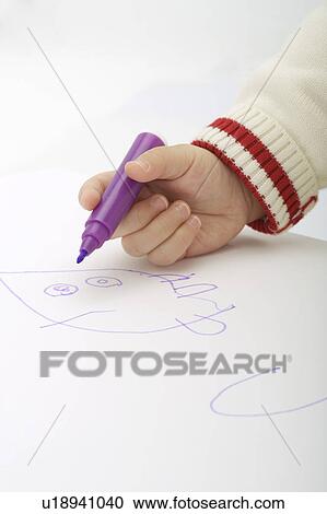 Child drawing on paper with color pen View Large Photo Image Stock Image - Child drawing on paper with color pen. Fotosearch