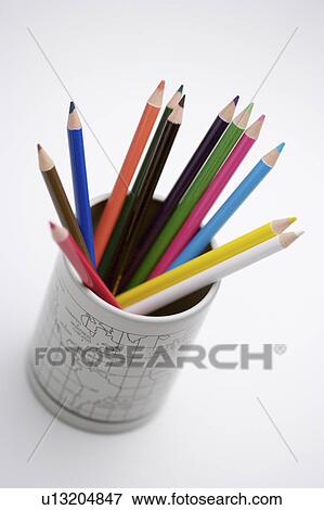 Stock Photo - Color pencils in a pen holder. Fotosearch