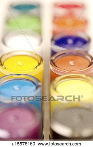 Stock Image - Colorful candles in rows. Fotosearch