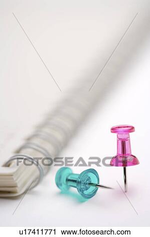 Stock Image - Straight Pins and notebook. Fotosearch