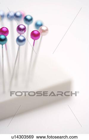 Straight Pins on a pile of papers View Large Photo Image Stock Photo - Straight Pins on a pile of papers. Fotosearch