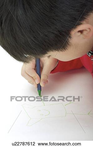 Young boy drawing on paper, side view View Large Photo Image Stock Image - Young boy drawing on paper, side view. Fotosearch