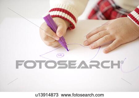 Young girl drawing on paper View Large Photo Image Stock Image - Young girl drawing on paper. Fotosearch