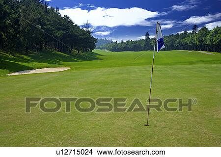 Flag in golf course View Large Photo Image Picture - Flag in golf course . Fotosearch