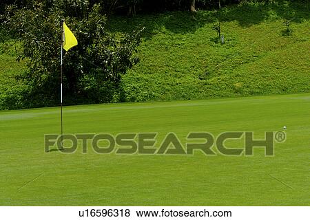 Stock Photo - Flag in golf course . Fotosearch
