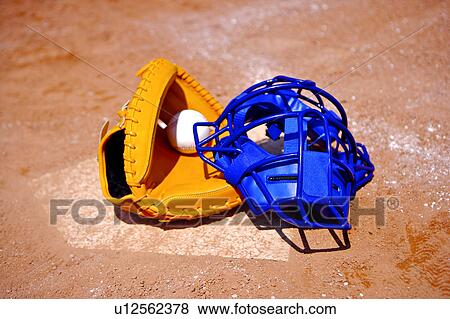 Baseball glove, cap and ball on home base View Large Photo Image Stock Photo - Baseball glove, cap and ball on home base. Fotosearch