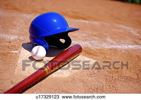 Baseball helmet, ball and bat on home plate View Large Photo Image Stock Image - Baseball helmet, ball and bat on home plate. Fotosearch