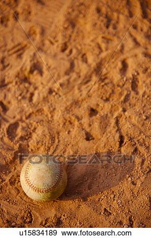 Stock Photo - Baseball on playing field. Fotosearch