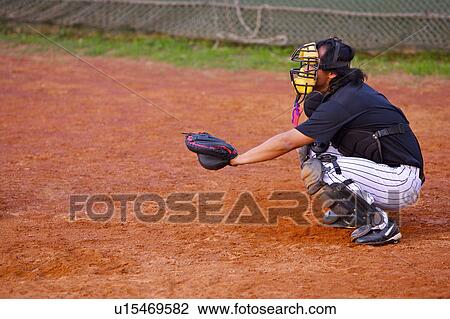 Baseball player crouching on playing field View Large Photo Image Stock Image - Baseball player crouching on playing field. Fotosearch