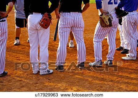 Stock Image - Baseball players, low section. Fotosearch
