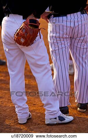 Baseball players, low section View Large Photo Image Stock Photo - Baseball players, low section. Fotosearch