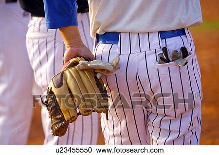 Baseball players, mid section View Large Photo Image Stock Image - Baseball players, mid section. Fotosearch