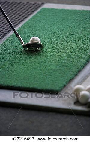 Club lined up with golf ball on driving range View Large Photo Image Stock Image - Club lined up with golf ball on driving range. Fotosearch