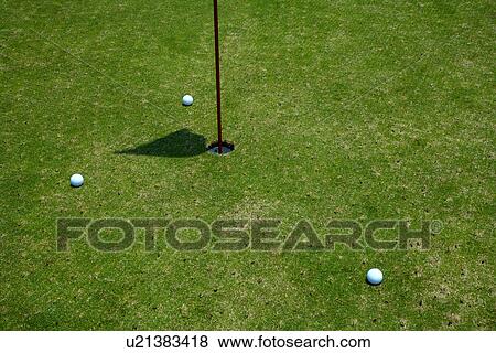 Stock Photo - Flag on putting green. Fotosearch