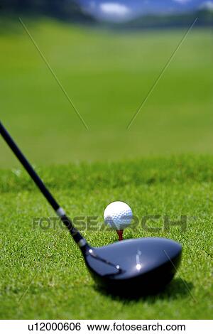Stock Photograph - Golf club, golf ball and tee. Fotosearch
