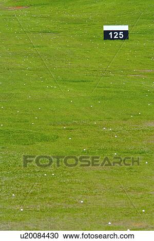 Stock Image - Practice target at golf course . Fotosearch