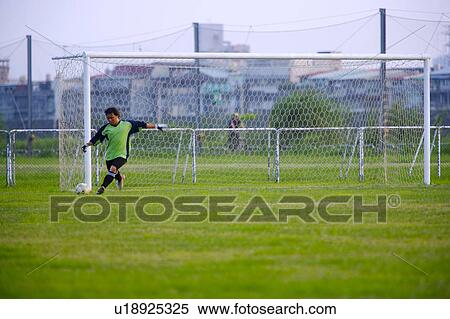 Stock Photography - Goalkeeper Saving Shot. Fotosearch