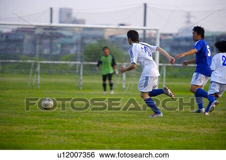 Stock Photograph - Soccer players. Fotosearch