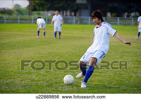 Stock Photograph - Soccer players. Fotosearch