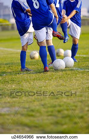 Soccer players warming up View Large Photo Image Stock Photograph - Soccer players warming up. Fotosearch