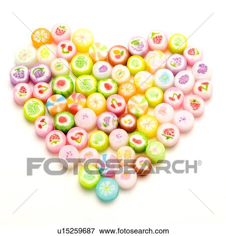 Candies form heart shape View Large Photo Image Stock Photo - Candies form heart shape. Fotosearch