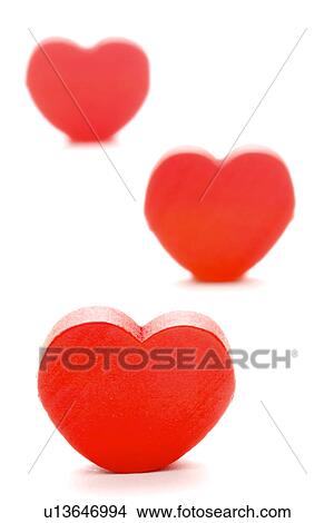 Picture - Three heart-shaped objects. Fotosearch
