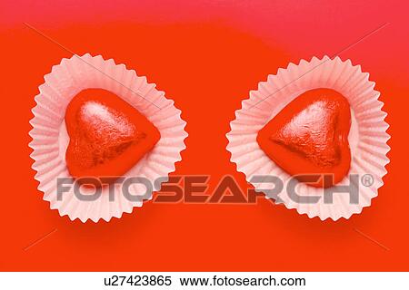 Two heart shaped candies View Large Photo Image Stock Photography - Two heart shaped candies. Fotosearch