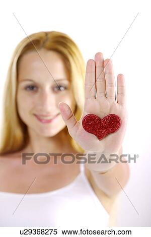 Young woman showing heart shape View Large Photo Image Stock Photography - Young woman showing heart shape. Fotosearch