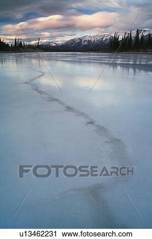 Stock Image - The North Saskatchewan River in winter - Kootenay Plains, Alberta. Fotosearch