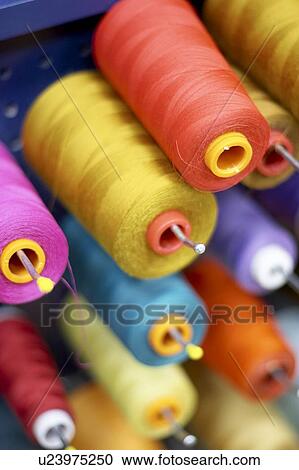 Stock Image - Colourful spools of thread, Canada, Ontario. Fotosearch