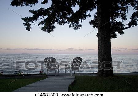 Cottage chair at Lake Manitoba, Canada View Large Photo Image Stock Image - Cottage chair at Lake Manitoba, Canada. Fotosearch