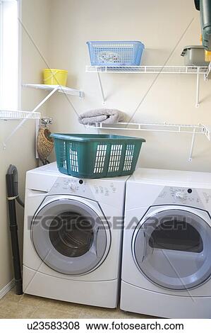 Energy and water efficient front loading washing machine, Winnipeg, Canada View Large Photo Image Stock Photo - Energy and water efficient front loading washing machine, Winnipeg, Canada. Fotosearch